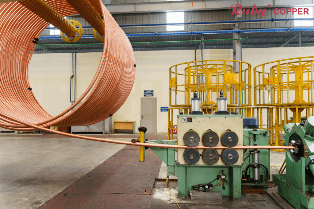 Copper tube drawing machine in operation