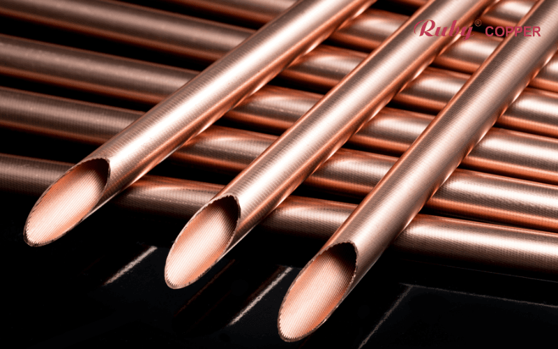 Inner grooved copper pipes for AC systems with enhanced heat transfer